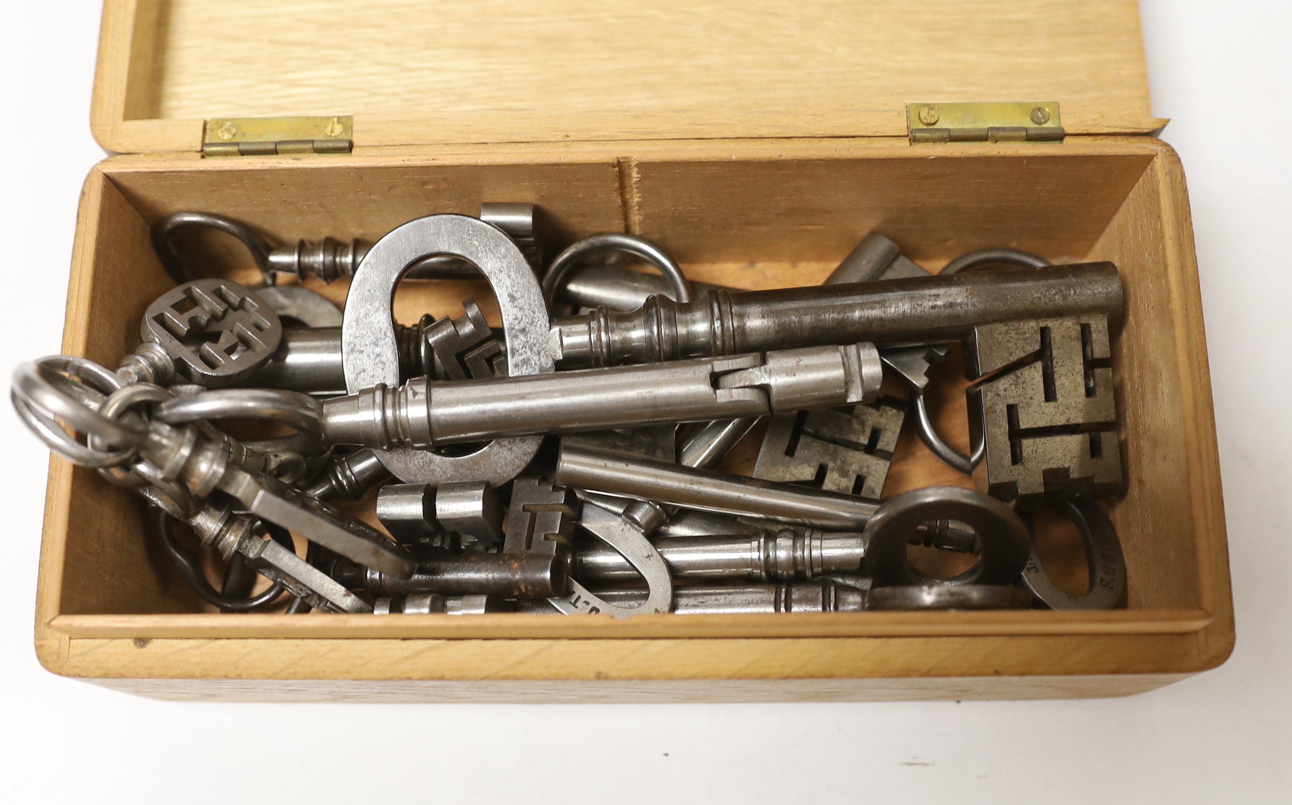 A box of assorted Odell and other keys